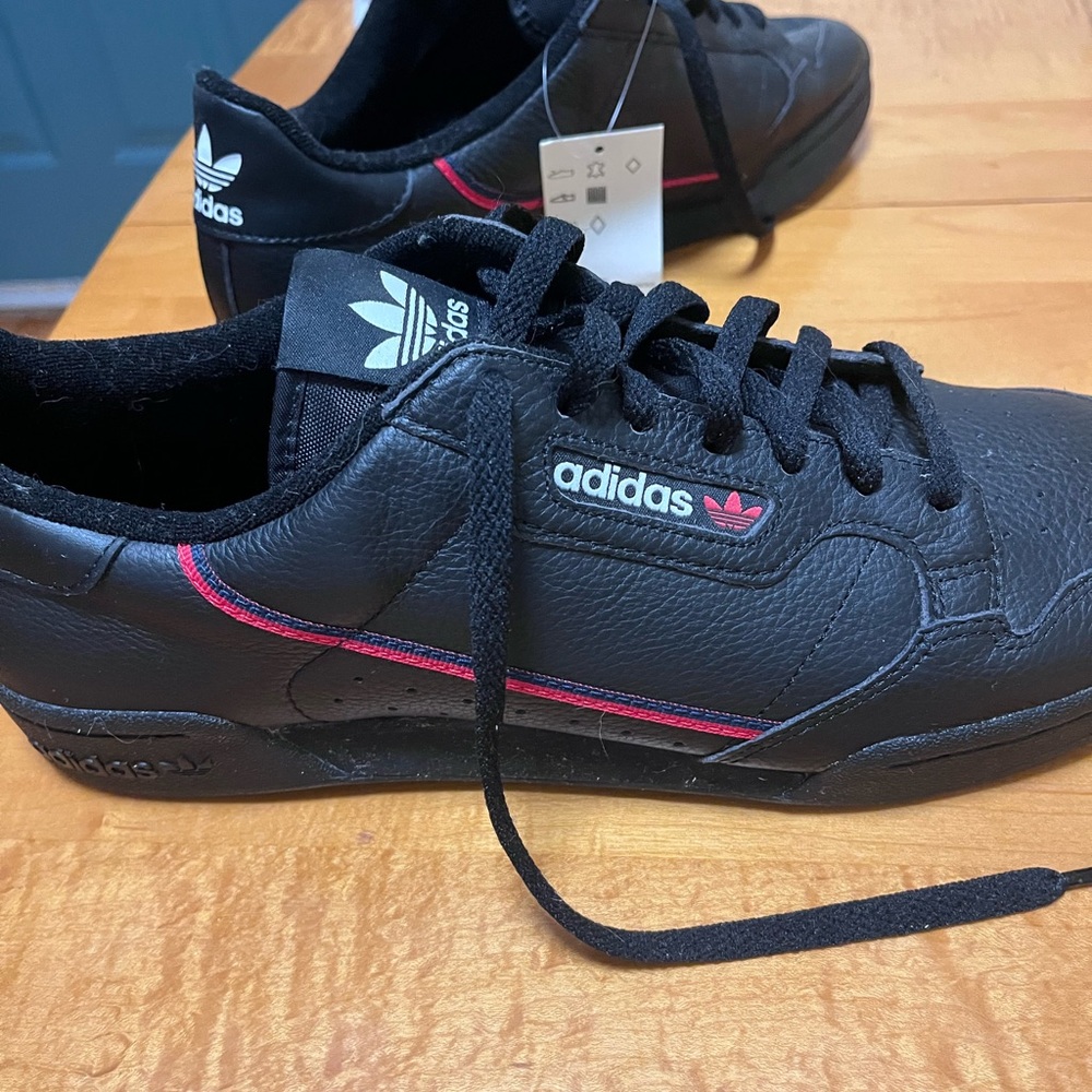 Brand new Adidas Black Shoes with Red Accent